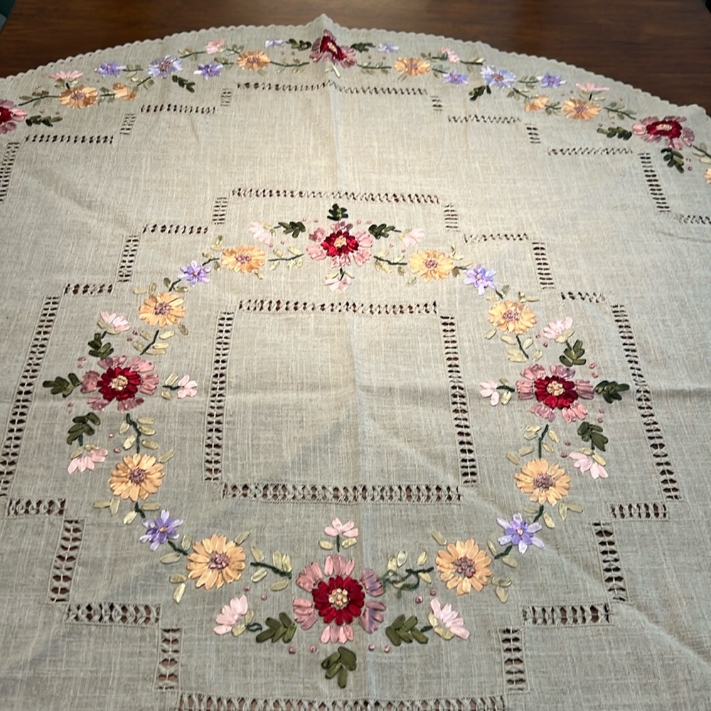 52” round tablecloth made in the Bahamas. Lots of detail work.